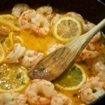 shrimps, butter, and lemon in a pan