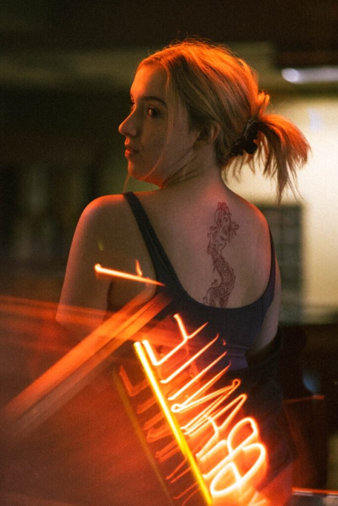 a woman with a dragon tattoo